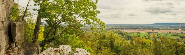 A view of fields and the Niagara Escarpment from a lookout spot at Rattlesnake Point.